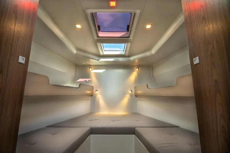 Explorer 1 Yacht Photos Pics Luxurious interior of 2024 Ridas 62 yacht with skylight and ambient lighting.