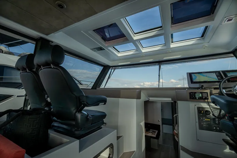 Explorer 1 Yacht Photos Pics Interior of 2024 Ridas 62 yacht with modern cockpit and panoramic windows.