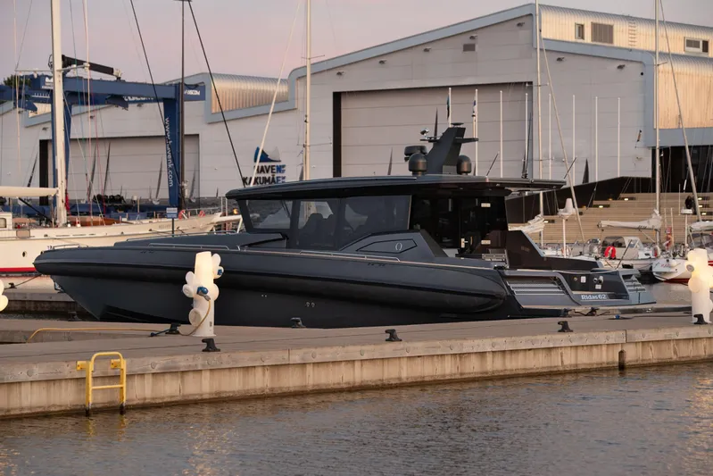 Explorer 1 Yacht Photos Pics Luxury Ridas 62 yacht docked at marina, 2024 model, sleek design.