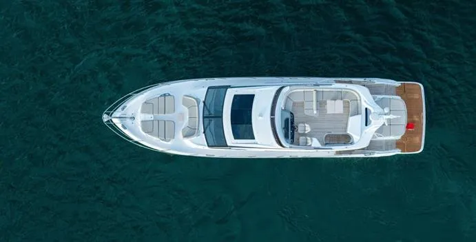  Yacht Photos Pics Aerial view of 2025 Princess S65 yacht on open water.