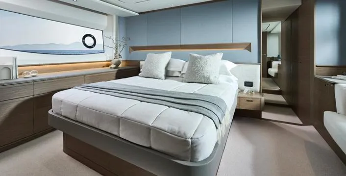  Yacht Photos Pics Luxurious bedroom interior of 2025 Princess S65 yacht, featuring modern design and elegant furnishings.