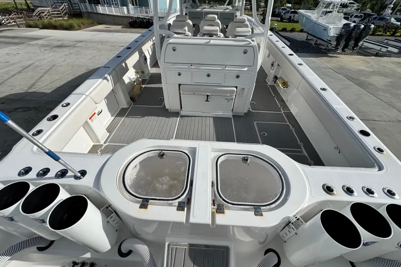  Yacht Photos Pics 2020 Invincible 40 Catamaran interior with fishing rod holders and storage compartments.
