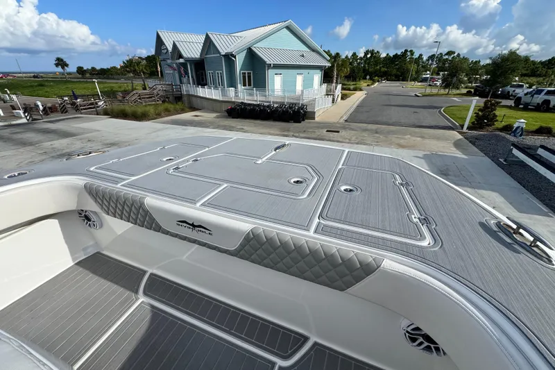  Yacht Photos Pics Invincible 40 Catamaran 2020 at dock, featuring spacious deck and modern design.