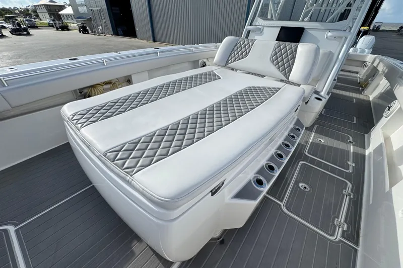  Yacht Photos Pics Luxurious seating on 2020 Invincible 40 Catamaran with diamond-stitched upholstery and sleek design.