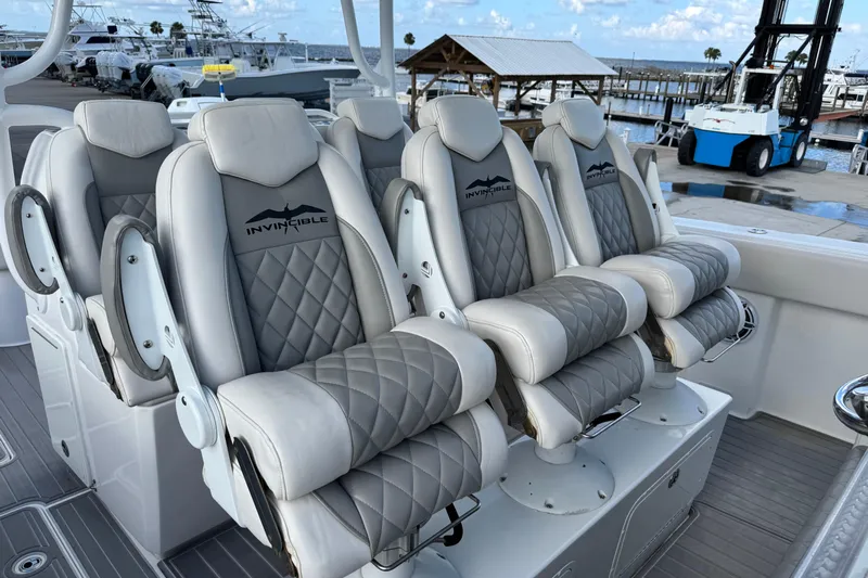  Yacht Photos Pics Luxurious seating on 2020 Invincible 40 Catamaran, featuring quilted leather and ergonomic design.
