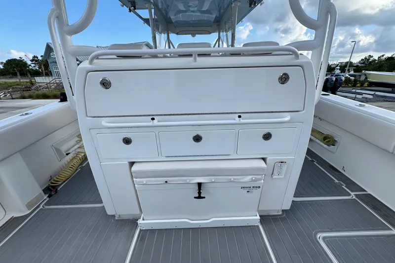  Yacht Photos Pics 2020 Invincible 40 Catamaran interior with storage compartments and seating.