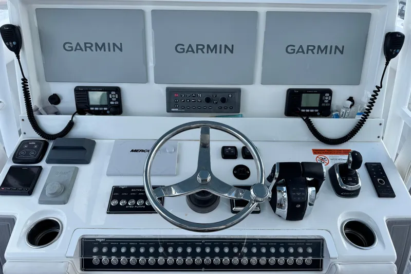  Yacht Photos Pics Helm of 2020 Invincible 40 Catamaran with Garmin displays and advanced controls.