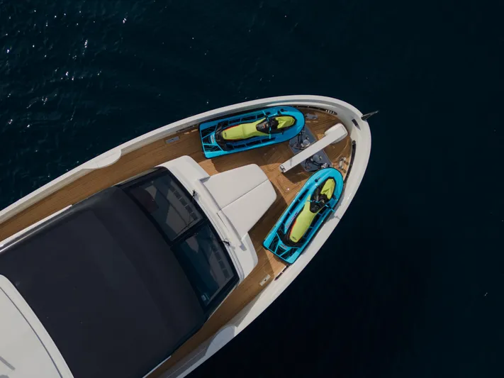 Mini K2 Yacht Photos Pics Aerial view of 2022 Extra X99 FAST yacht with kayaks on deck.