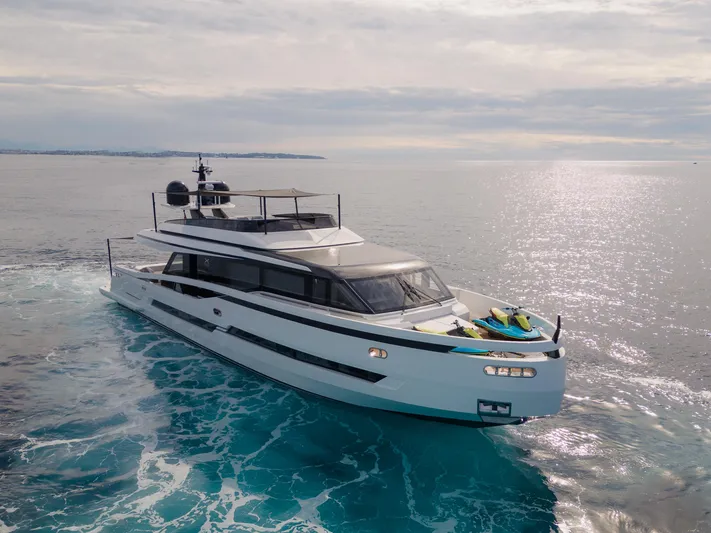 Mini K2 Yacht Photos Pics Luxury yacht Extra X99 FAST 2022 cruising on open sea with jet skis onboard.