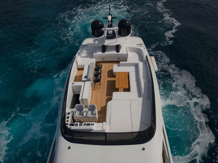 Mini K2 Yacht Photos Pics Luxury yacht Extra X99 FAST 2022 cruising on blue ocean waters.