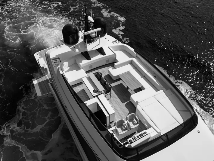 Mini K2 Yacht Photos Pics Luxury yacht Extra X99 FAST 2022 cruising on open water, aerial view.