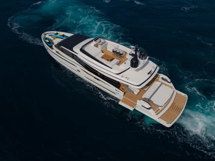 Mini K2 Yacht Photos Pics Luxurious 2022 Extra X99 FAST yacht cruising on open sea, aerial view.