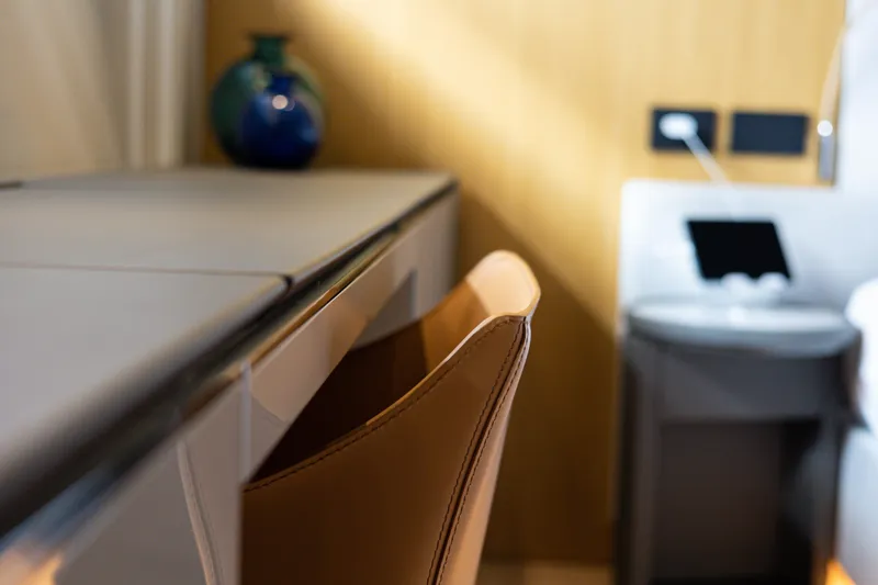 Mini K2 Yacht Photos Pics Modern office desk with leather chair and decorative vase, Extra X99 FAST 2022 model.