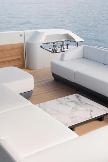 Mini K2 Yacht Photos Pics Luxury seating area on 2022 Extra X99 FAST yacht with ocean view.