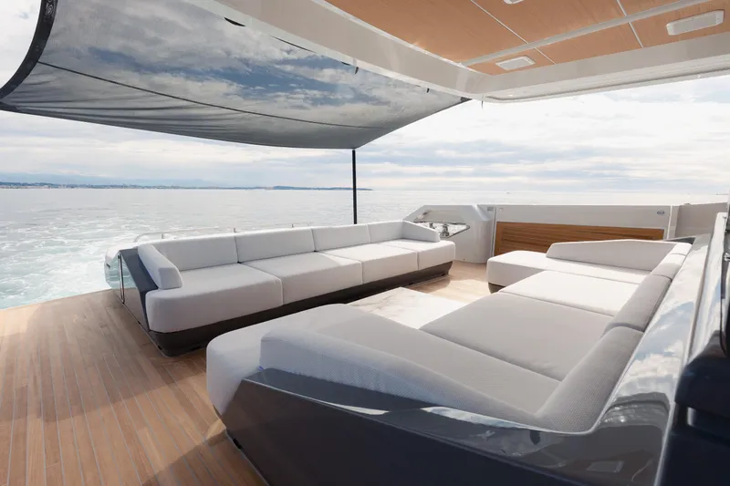 Mini K2 Yacht Photos Pics Luxurious 2022 Extra X99 FAST yacht deck with modern seating and ocean view.