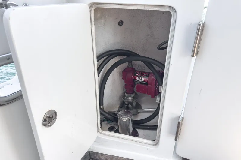 Encore Yacht Photos Pics Open compartment on 2006 Ocean Alexander 64 Pilothouse yacht showing mechanical equipment.