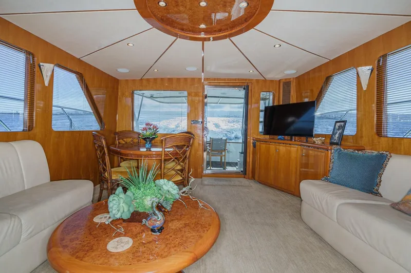 Encore Yacht Photos Pics Luxurious interior of 2006 Ocean Alexander 64 Pilothouse yacht with elegant wood finishes.
