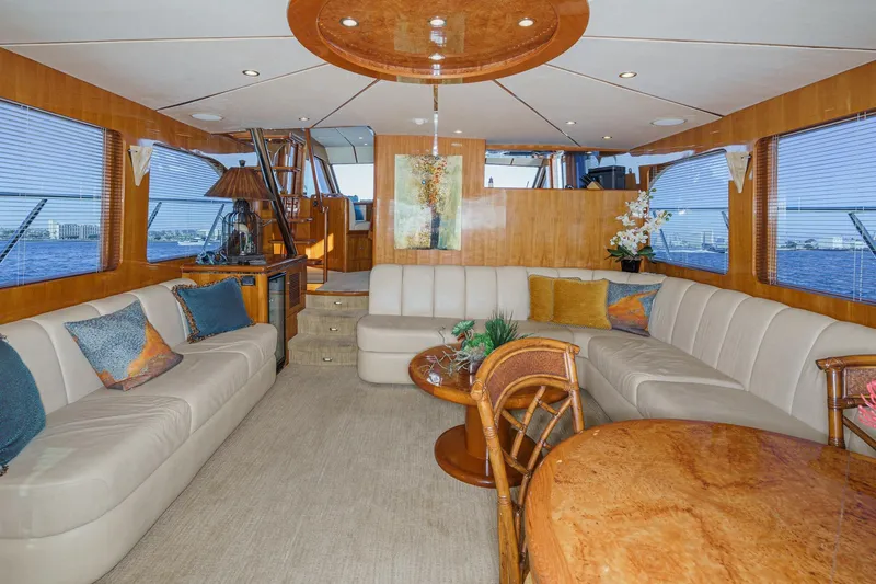 Encore Yacht Photos Pics Luxurious interior of 2006 Ocean Alexander 64 Pilothouse yacht with elegant seating and decor.