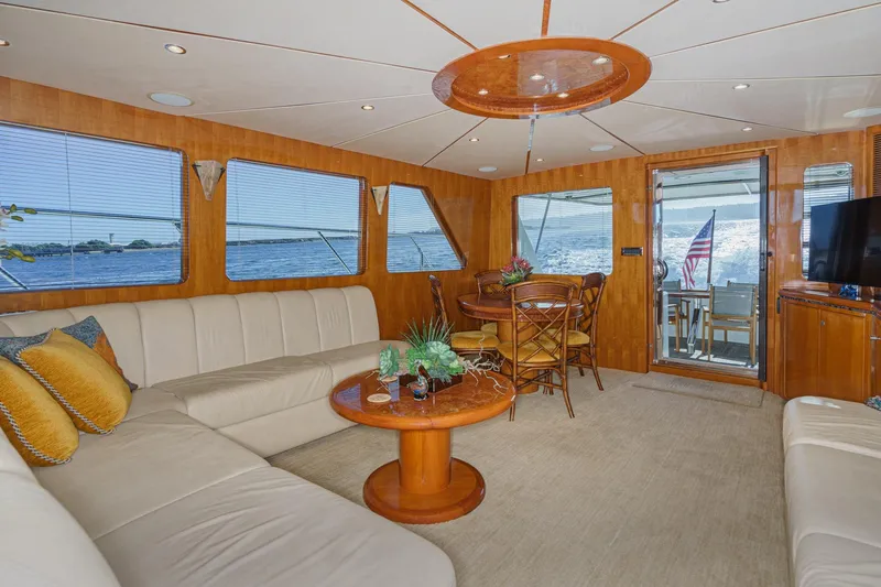 Encore Yacht Photos Pics Luxurious interior of 2006 Ocean Alexander 64 Pilothouse yacht with elegant seating and ocean view.