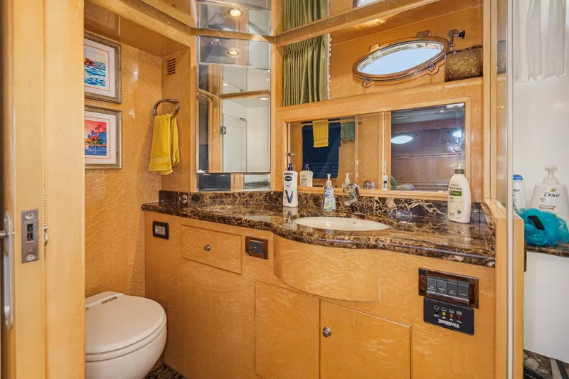 Encore Yacht Photos Pics Luxurious bathroom in 2006 Ocean Alexander 64 Pilothouse yacht with marble countertop.