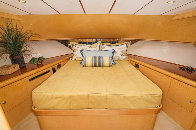 Encore Yacht Photos Pics Luxurious bedroom interior of 2006 Ocean Alexander 64 Pilothouse yacht with elegant bedding.