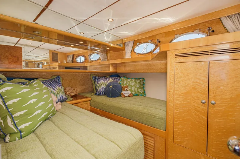 Encore Yacht Photos Pics Luxurious 2006 Ocean Alexander 64 Pilothouse cabin with cozy twin beds and elegant wood finish.