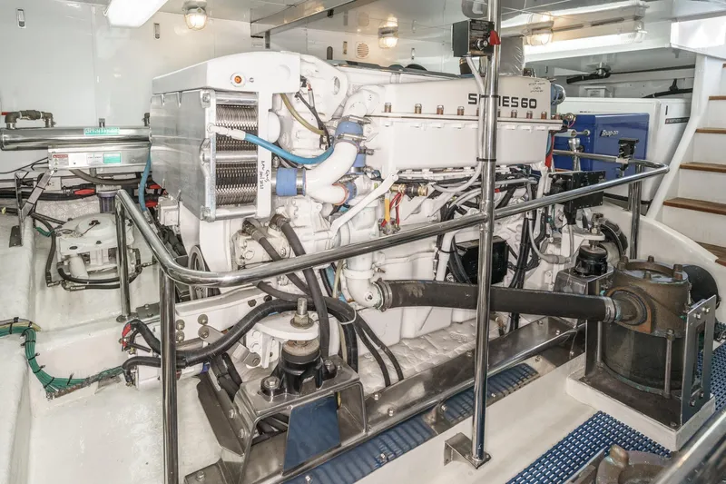 Encore Yacht Photos Pics Engine room of 2006 Ocean Alexander 64 Pilothouse yacht, showcasing machinery and equipment.