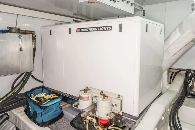 Encore Yacht Photos Pics Engine room of 2006 Ocean Alexander 64 Pilothouse with Northern Lights generator.