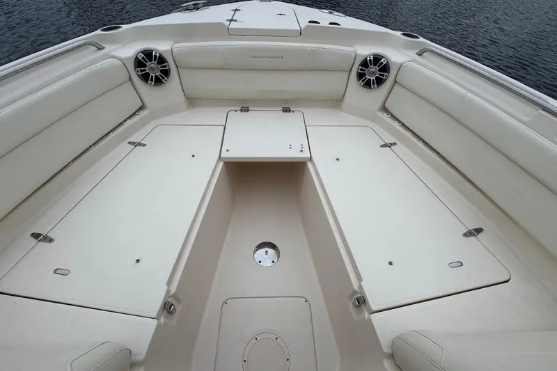  Yacht Photos Pics 2020 Grady-White Freedom 285 boat interior with spacious seating and storage.