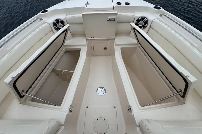  Yacht Photos Pics 2020 Grady-White Freedom 285 boat interior with open storage compartments.