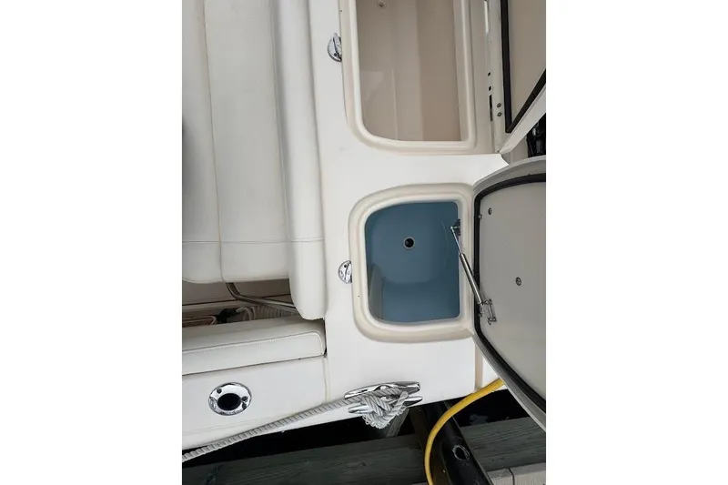  Yacht Photos Pics 2020 Grady-White Freedom 285 boat interior with open storage compartments.