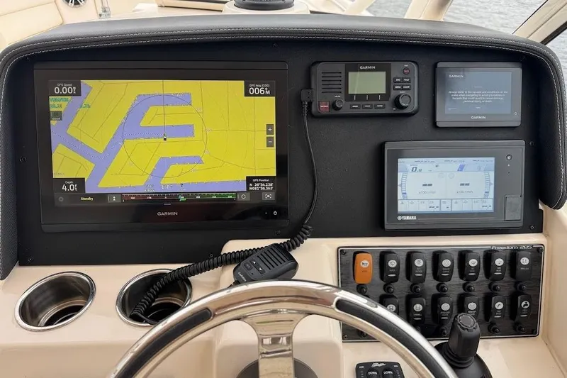  Yacht Photos Pics 2020 Grady-White Freedom 285 dashboard with Garmin navigation and Yamaha controls.