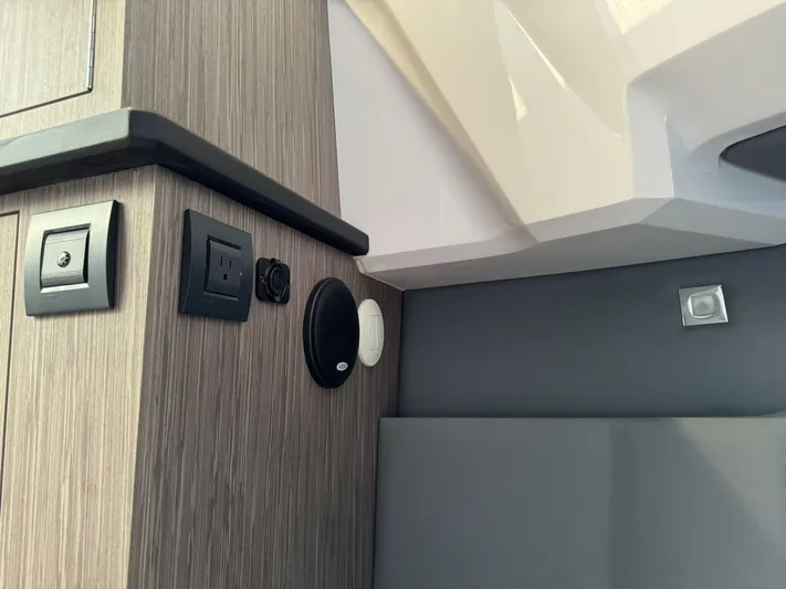  Yacht Photos Pics Interior detail of 2025 Ranieri CAYMAN 38.0 EXECUTIVE, featuring modern control panel and speaker.