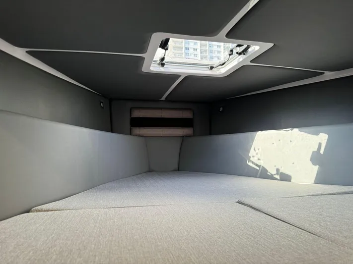  Yacht Photos Pics Interior cabin of the 2025 Ranieri CAYMAN 38.0 EXECUTIVE boat with a skylight.