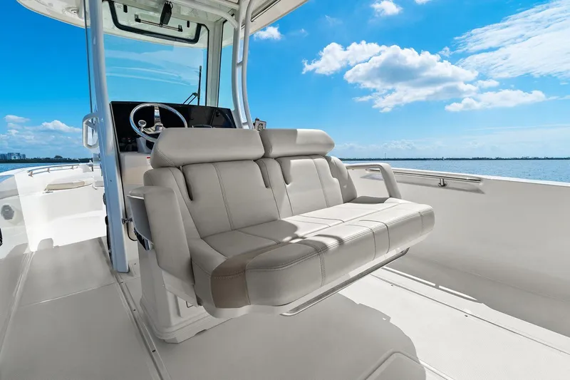  Yacht Photos Pics 2025 Boston Whaler 280 Dauntless boat interior with luxurious seating and ocean view.