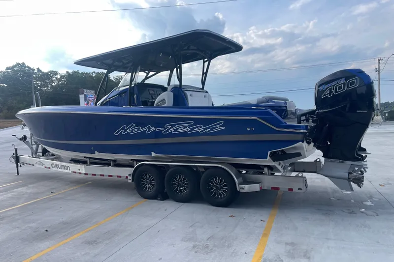 Fresh Water!! Low Hours!! Yacht Photos Pics 2022 Nor-Tech 340 Sport Center Console boat on trailer, featuring Mercury Racing 400 engine.