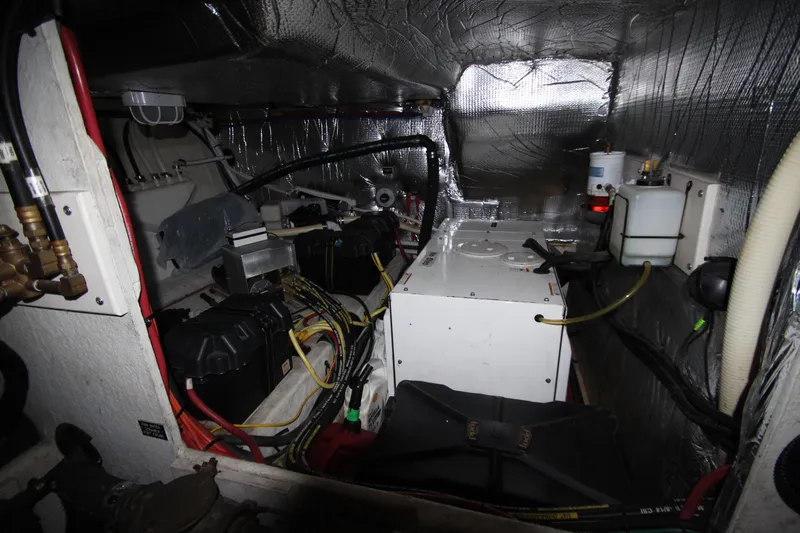  Yacht Photos Pics Engine room of 2003 Cruisers Yachts 4450 Express Motoryacht with mechanical components.