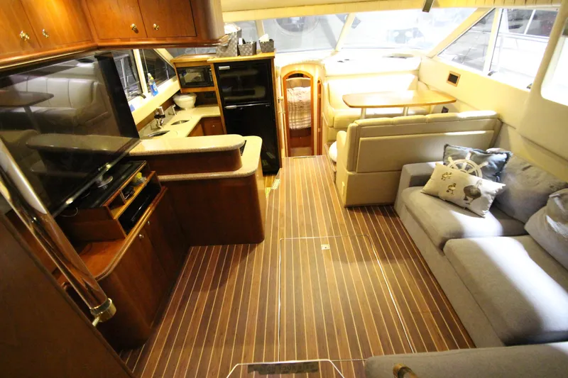  Yacht Photos Pics Luxurious interior of 2003 Cruisers Yachts 4450 Express Motoryacht with modern amenities.