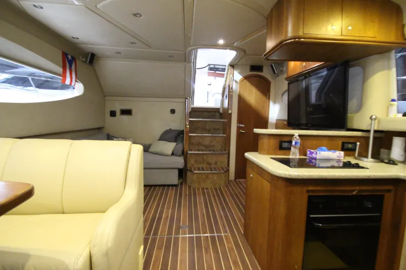  Yacht Photos Pics Luxurious interior of 2003 Cruisers Yachts 4450 Express Motoryacht with modern amenities.