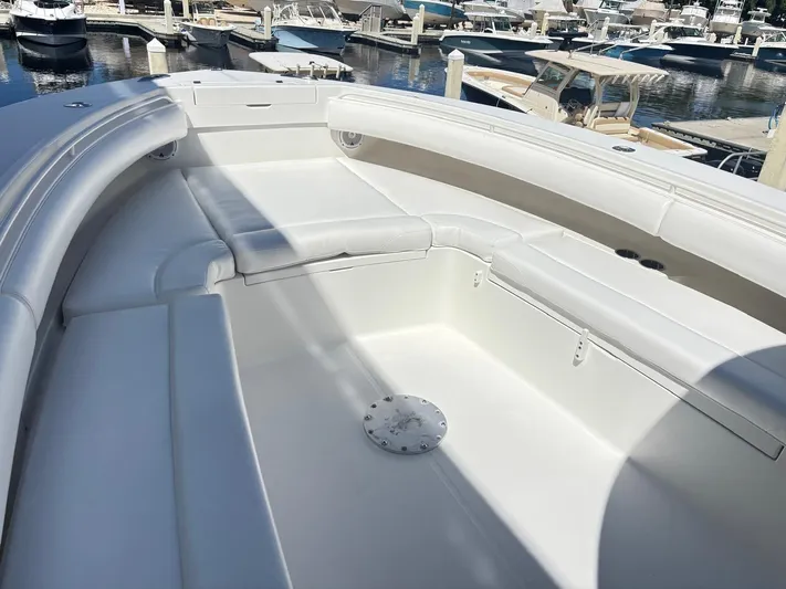  Yacht Photos Pics Spacious seating area on 2015 Regulator 34 CC boat at marina.