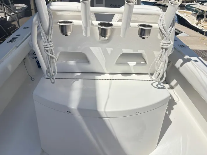  Yacht Photos Pics 2015 Regulator 34 CC boat with rod holders and ropes on deck.