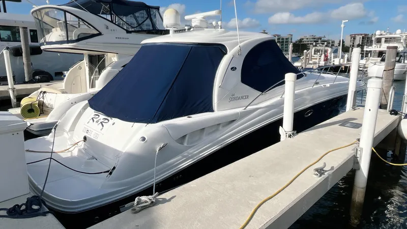 Lowest Price In Usa Yacht Photos Pics 2008 Sea Ray 44 Sundancer yacht docked at marina with blue covers.