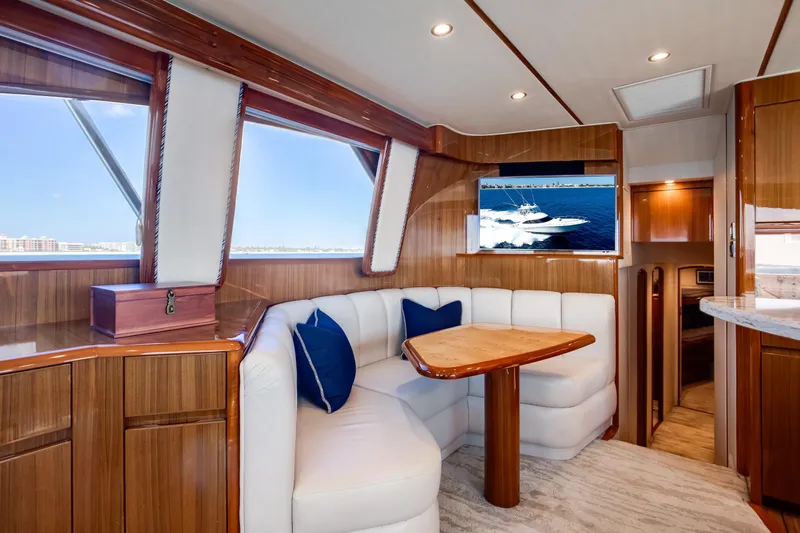 Dorothy Marie Yacht Photos Pics Luxurious interior of 2017 Viking 48 Convertible yacht with elegant seating and wood finishes.