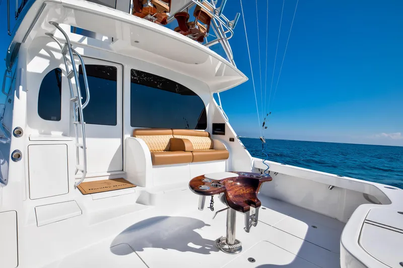 Dorothy Marie Yacht Photos Pics 2017 Viking 48 Convertible yacht deck with seating and ocean view.