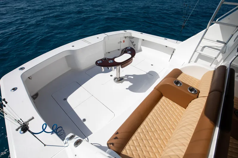 Dorothy Marie Yacht Photos Pics Luxury deck of 2017 Viking 48 Convertible yacht with seating and ocean view.