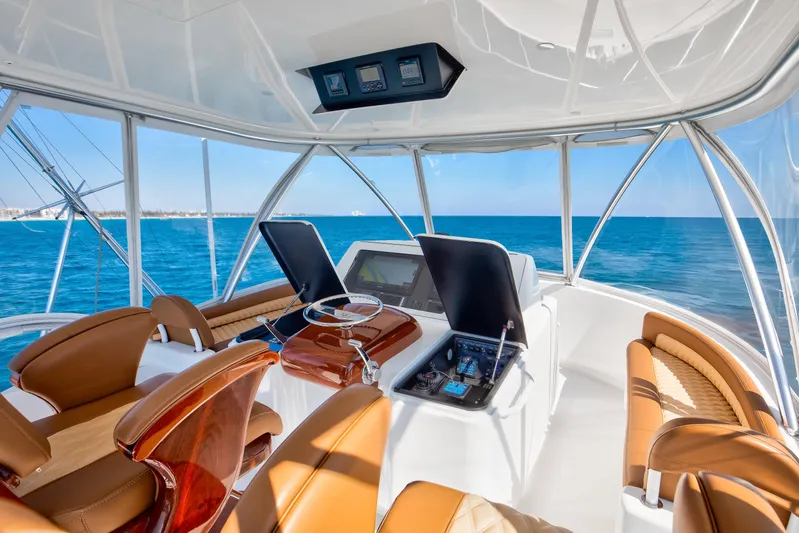 Dorothy Marie Yacht Photos Pics Luxurious interior of 2017 Viking 48 Convertible yacht with ocean view.