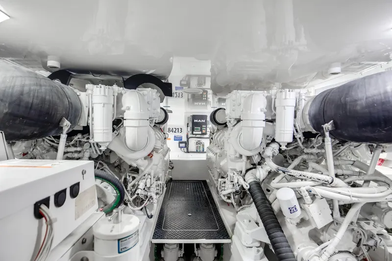 Dorothy Marie Yacht Photos Pics Engine room of a 2017 Viking 48 Convertible yacht, showcasing advanced machinery.