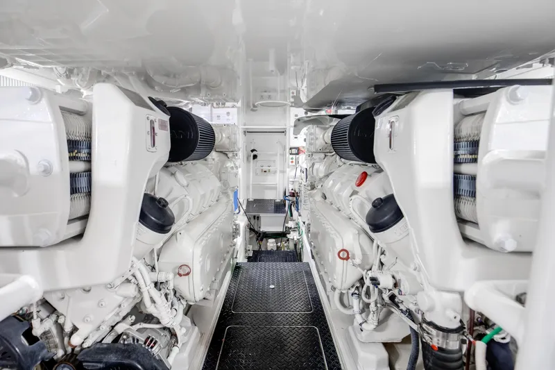 Dorothy Marie Yacht Photos Pics Engine room of 2017 Viking 48 Convertible yacht, showcasing dual engines and mechanical components.