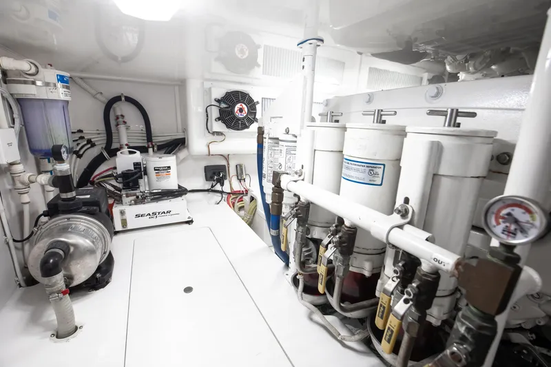 Dorothy Marie Yacht Photos Pics Engine room of 2017 Viking 48 Convertible yacht, showcasing mechanical components and systems.