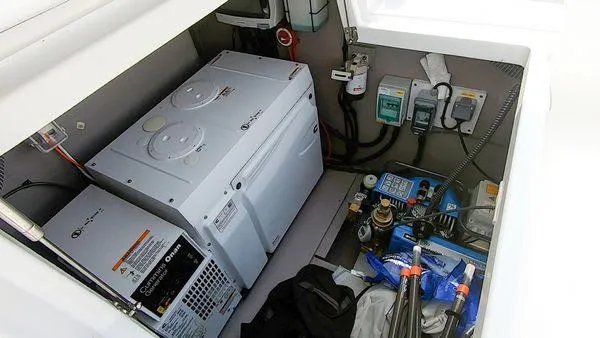 Joy Yacht Photos Pics Electrical compartment of a 2021 Bali 5.4 yacht, featuring power systems and equipment.
